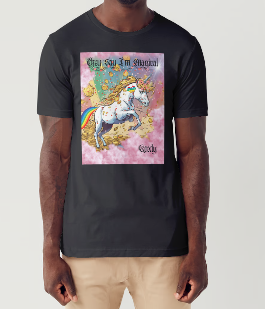 This is a black t-shirt entitled "they say I'm magical", features a White unicorn with a blinding light from its' horn, a golden mane and a rainbow tail galloping through cotton candy pink clouds filled with raining golden coins and a multicolor background. This shirt is for the bold unapologetically yourself type of guy. YOLO. This is part of the Mike Roxly Collection.