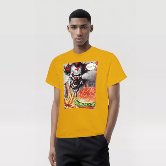 This is a picture of a model wearing roxly persona's mustard yellow graphic tee shirt. The shirt has an evil looking clown smiling in the back with cloud thought MMM. In front is displayed a tasty looking burger and fries.