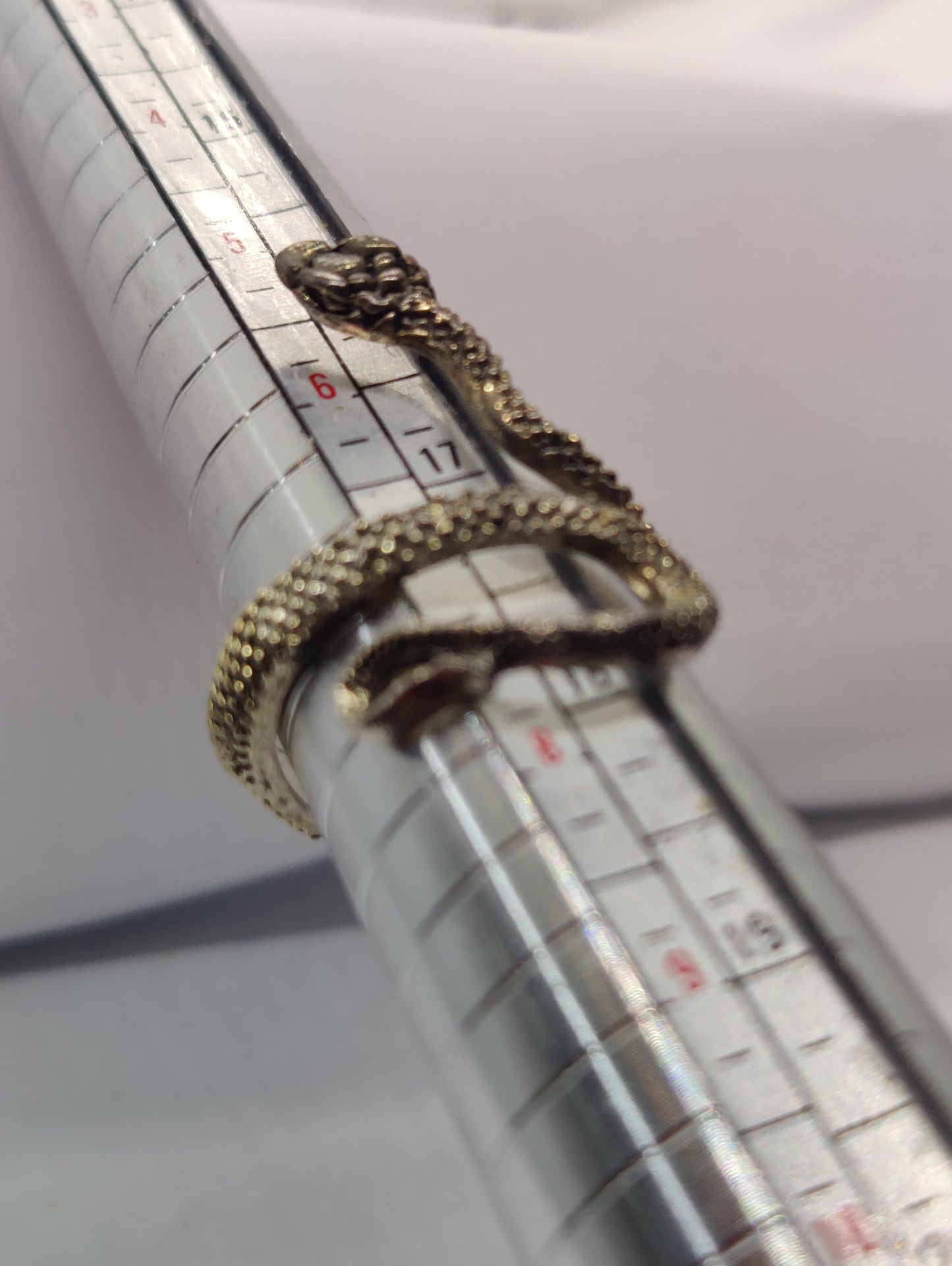 Black shedding snake ring